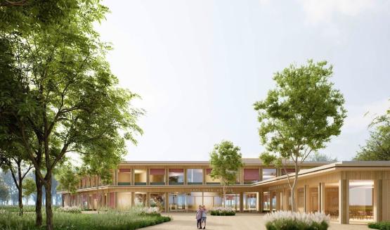 Die Grafik zeigt die Außenansicht des geplanten Neubaus der Carl-Orff-Schule. Rechts ist das Medienzentrum Emsland zu sehen. 